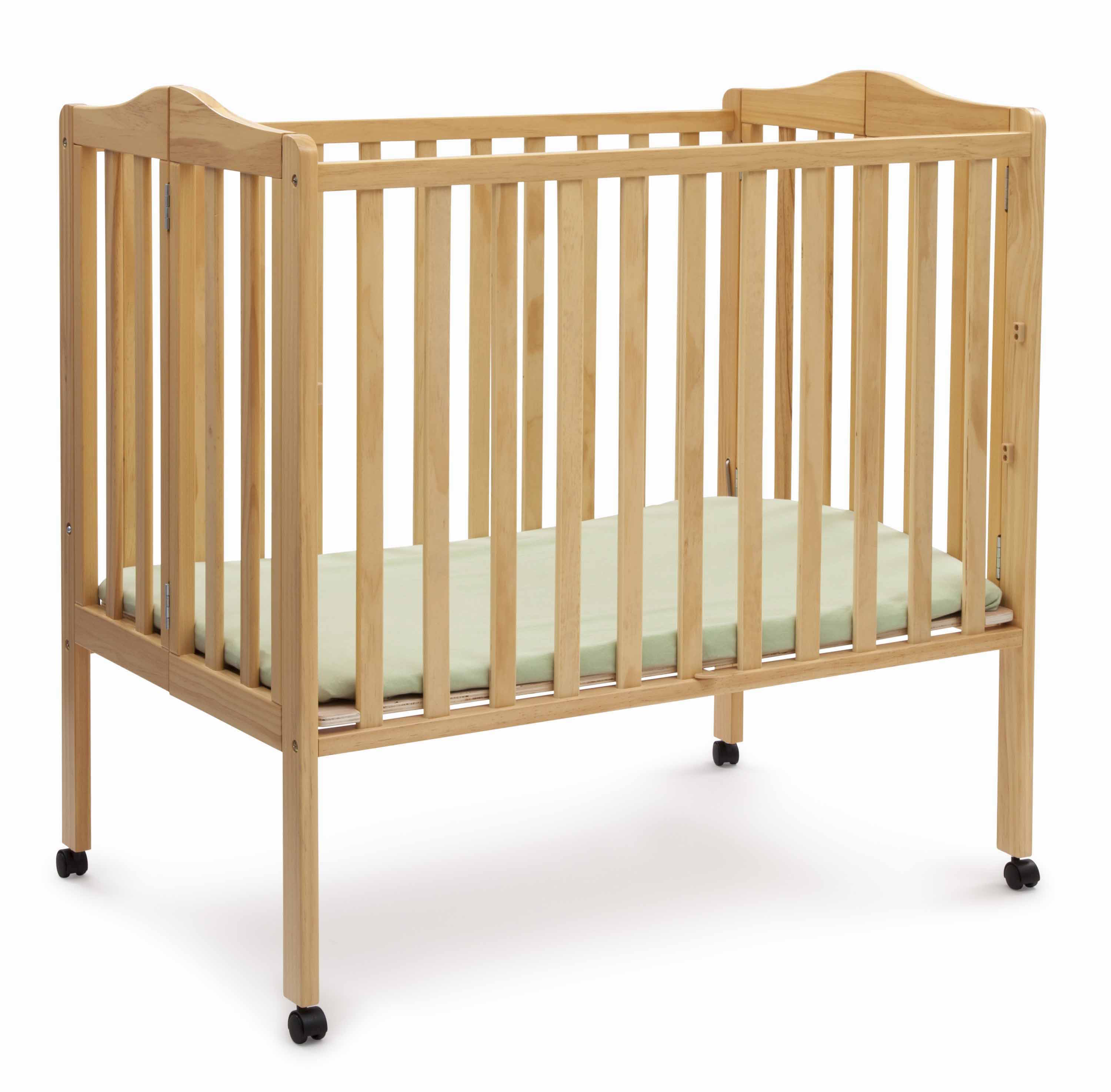 Compact Size Folding Crib With Mattress and Sheets